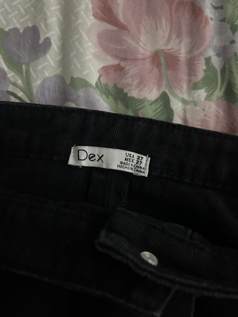Embroidered Black Denim Skirt (Category: Skirts) located in Manila. Submitted by cheatea (Listing ID 1433181458, Image 3). Description: - Dex black denim skirt - Size 27 - A-line silhouette - Features floral embroidery - Button closure - Plain black back - Made in China.