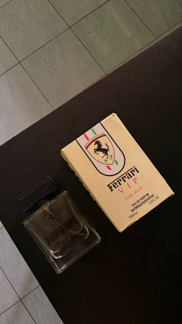 Ferrari VIP for Men Eau de Parfum (Category: Fragrance & Deodorants) located in Manila. Submitted by ciiii1 (Listing ID 1433071665, Image 2). Description: - Authentic Ferrari VIP for Men Eau de Parfum - 100ml bottle - Includes original box - Black cap and clear bottle design - Beige box with Ferrari logo and product name.