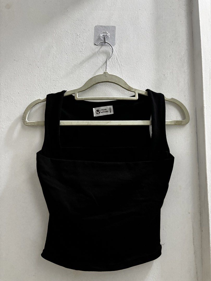 Fhilar Apparel Black Tank Top - Small (Category: Sleeveless) located in Quezon City. Submitted by baristaseller (Listing ID 1433124411, Image 1). Description: - Philar Apparel black tank top - Size: Small - Features a square neckline - Thick straps - Solid black color - Made of smooth fabric - Form-fitting design.
