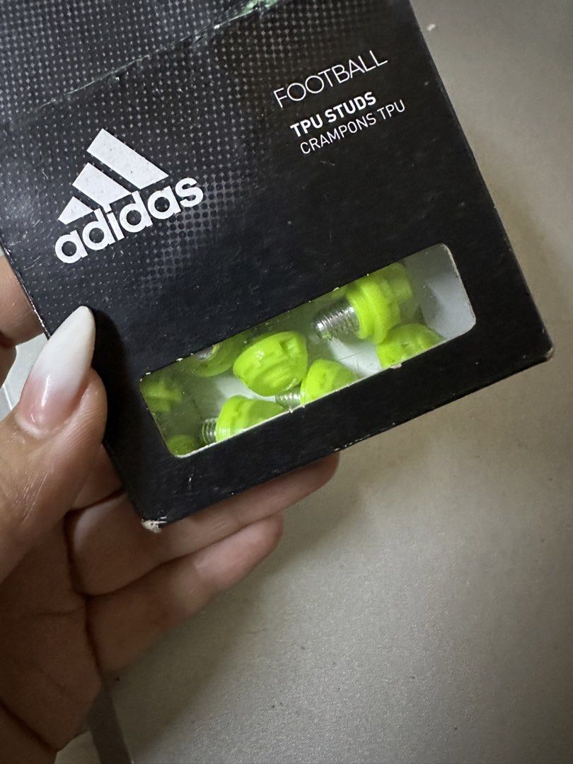 Football TPU Studs Crampons TPU (Category: Racket and Ball Sports) located in Manila. Submitted by salmongirl88 (Listing ID 1433063301, Image 2). Description: Brand new Authentic Adidas 12 pieces.