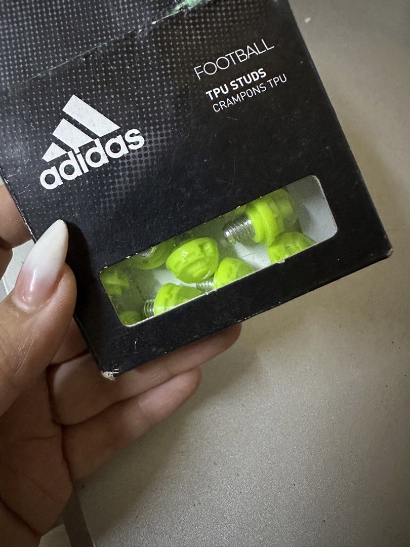 Football TPU Studs Crampons TPU (Category: Racket and Ball Sports) located in Manila. Submitted by salmongirl88 (Listing ID 1433063301, Image 3). Description: Brand new Authentic Adidas 12 pieces.