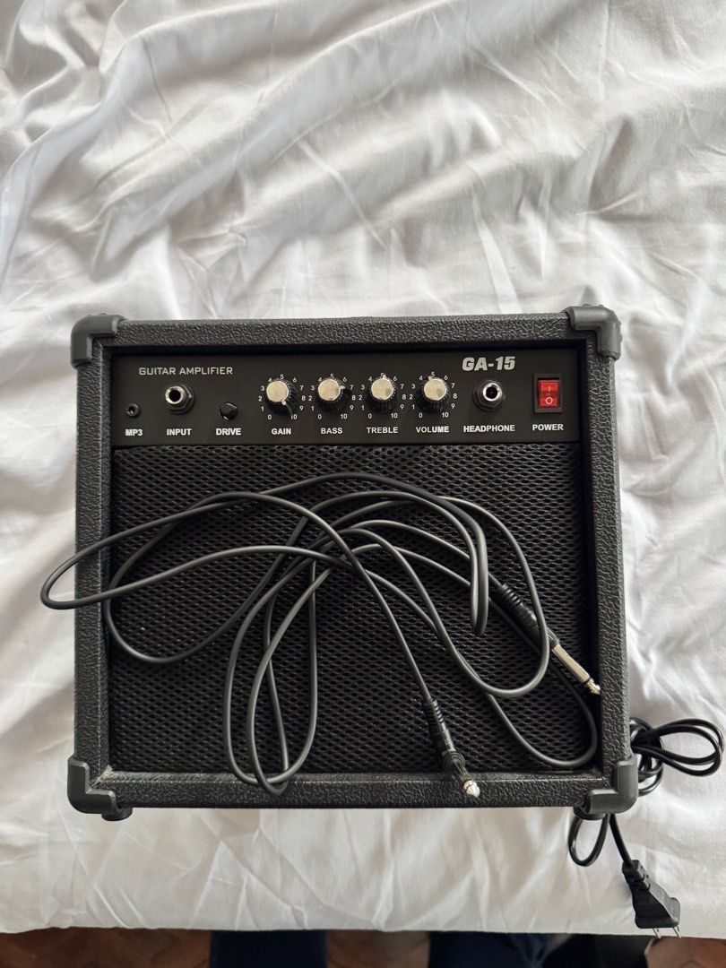 GA-15 Guitar Amplifier (Category: Musical Instruments) located in Caloocan City. Submitted by johnlemon4348 (Listing ID 1433086499, Image 3). Description: - GA-15 Guitar Amplifier - MP3 Input - Controls: Drive, Gain, Bass, Treble, Volume - Headphone Jack - Power Switch - Includes: Power Cable, Guitar Cable - Input Power: AC 220V-240V, 50Hz.