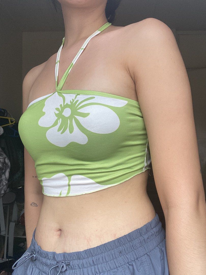 Green Floral Halter Top (Category: Sleeveless) located in Manila. Submitted by dodoheeee (Listing ID 1432912375, Image 3). Description: - Green and white floral pattern - Tie-up halter neck - Smooth, silky material - Great for casual or beach outfits.