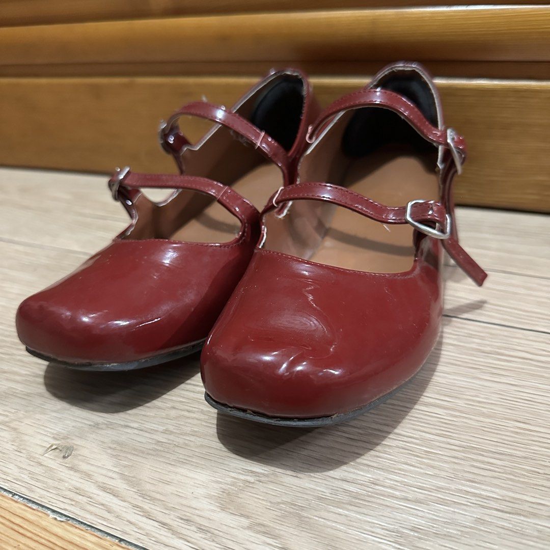 GRIZA Red Mary Jane Shoes (Category: Flats & Sandals) located in Quezon City. Submitted by purinluver (Listing ID 1433058357, Image 1). Description: - GRIZA Mary Jane shoes in red - Glossy finish - Double straps - Square toe design - Small heel - GRIZA logo visible - Perfect for everyday or special occasions.