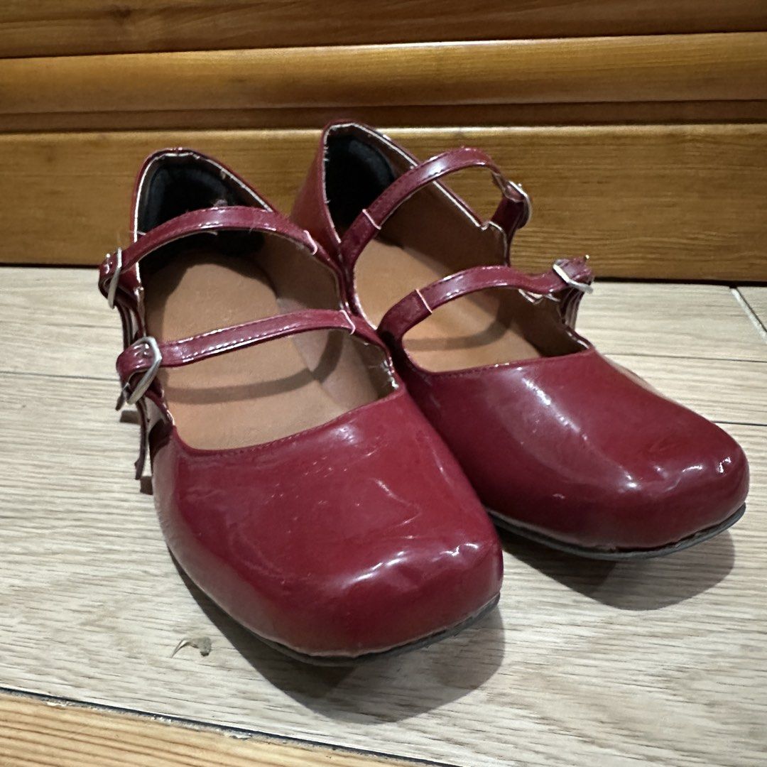GRIZA Red Mary Jane Shoes (Category: Flats & Sandals) located in Quezon City. Submitted by purinluver (Listing ID 1433058357, Image 2). Description: - GRIZA Mary Jane shoes in red - Glossy finish - Double straps - Square toe design - Small heel - GRIZA logo visible - Perfect for everyday or special occasions.