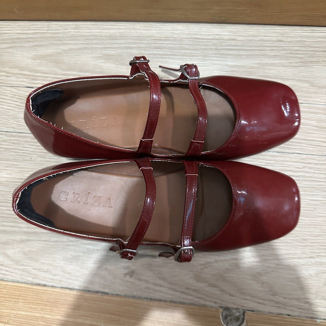 GRIZA Red Mary Jane Shoes (Category: Flats & Sandals) located in Quezon City. Submitted by purinluver (Listing ID 1433058357, Image 3). Description: - GRIZA Mary Jane shoes in red - Glossy finish - Double straps - Square toe design - Small heel - GRIZA logo visible - Perfect for everyday or special occasions.