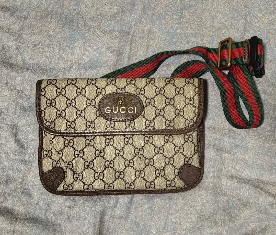 Gucci GG Supreme Waist Bag (Category: Luxury Bags & Wallets) located in Quezon City. Submitted by flat.earther23 (Listing ID 1433201570, Image 1). Description: - Gucci waist bag - Iconic GG Supreme canvas - Brown leather trim - Green and red striped strap - Flap closure with Gucci logo - Interior serial number tag - Classic design - Perfect for everyday use.