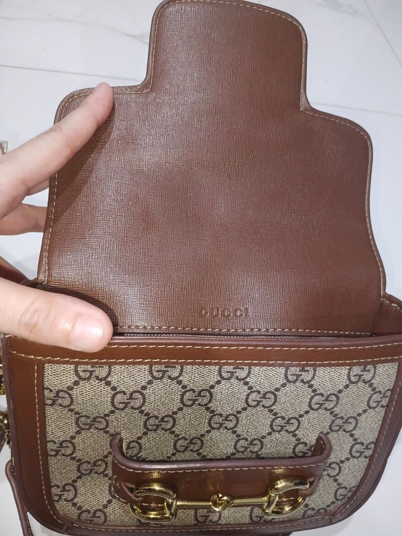 Gucci Horsebit 1955 Mini Bag (Category: Luxury Bags & Wallets) located in Manila. Submitted by daisuki8 (Listing ID 1433082886, Image 3). Description: - Authentic Gucci Horsebit 1955 Mini Bag - Brown leather trim - Gold-toned Horsebit detail - Detachable shoulder strap - Spacious interior with light-colored fabric lining - Flap closure - Gold-toned hardware.