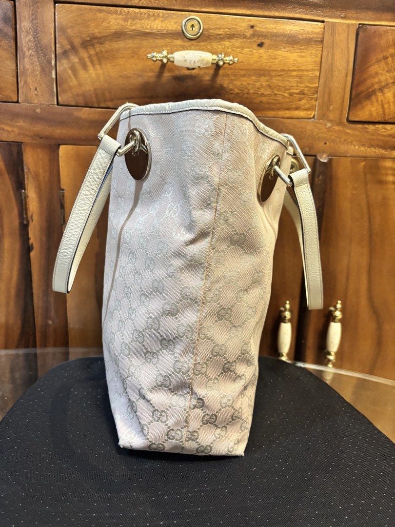 Gucci pink canvass tote (Category: Luxury Bags & Wallets) located in Imus. Submitted by bagsofblessings24 (Listing ID 1433154173, Image 2). Description: Gucci pink canvas tote Medium size, coded Very good condition Verbally authenticated by Japan buyer of preloved Intact straps and rubber lining Minor tolerable flaws - hairlines on the hardware and tiny rubs at the bottom corner, dirt in the interior Height 12 x length 9.5 x bottom 4 in Pm for ot