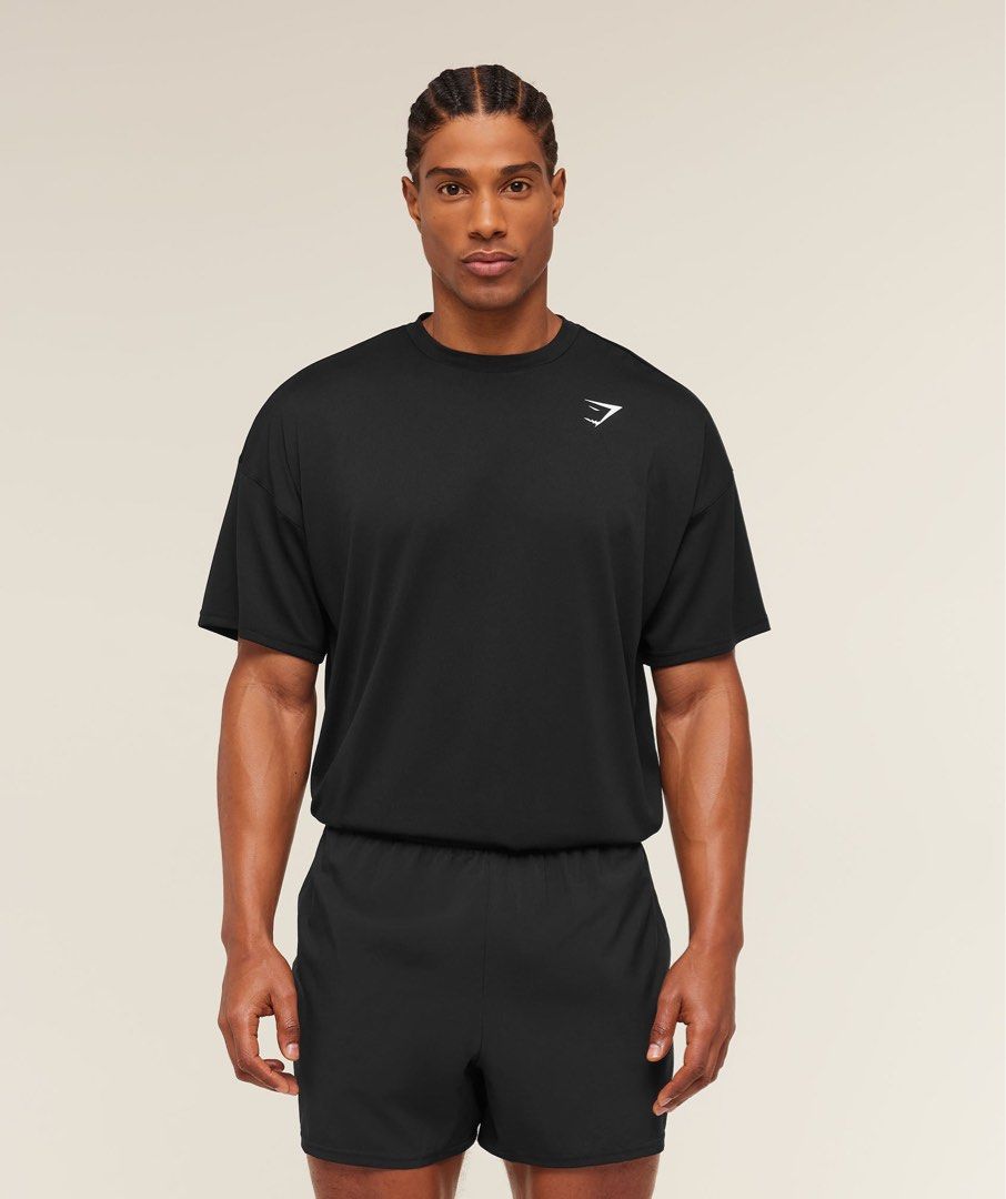 Gymshark Arrival Oversized T-Shirt - Black (Category: Activewear) located in Quezon City. Submitted by cptsp (Listing ID 1433091619, Image 1). Description: - Gymshark Arrival Oversized T-Shirt - Color: Black - Brand new, with original packaging - Features: Crew neck, short sleeves, Gymshark logo on chest - Material: Lightweight, breathable fabric - Fit: Oversized for a relaxed feel - Ideal for: Workouts and casual wear.