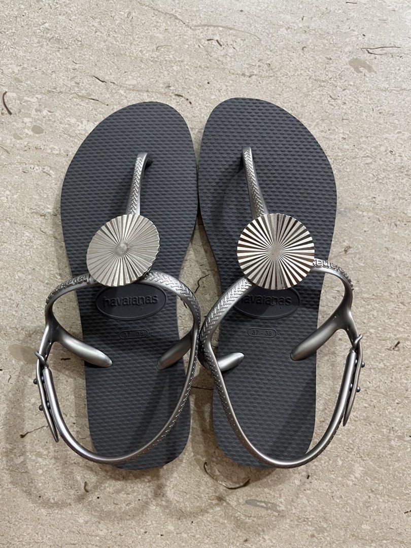 Havaianas Twist Metal Sandals - Size 37/38 (Category: Sandals) located in Singapore. Submitted by portia1218 (Listing ID 1433070547, Image 2). Description: Worn once only. As good as brand new condition. - Size: 37/38 - Unique design with metallic accent - Perfect for everyday wear.