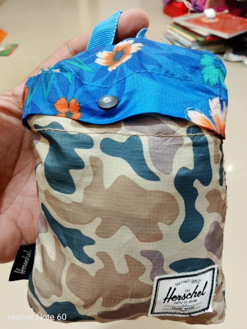 Herschel Supply Co. Packable Daypack Bag (Category: Backpacks) located in Tagum. Submitted by tgm2023 (Listing ID 1433180691, Image 3). Description: Herschel Supply Co. Packable Daypack Color : Duck Camo/Paradise Excellent condition Vol. : approx 18L to 20L Packable ✅ Lightweight ✅ Compact ✅ Ripstop fabric ✅ Water repellent ✅ 🏷️400.⁰⁰.