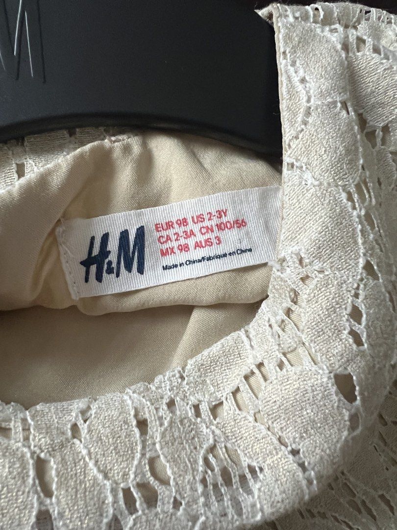 H&M Glittery Lace Dress (Category: Babies & Kids Fashion) located in Marikina City. Submitted by prelovedreeses (Listing ID 1433043677, Image 3). Description: - H&M lace dress - Cream color - Short sleeves - Back zipper closure - Size: EUR 98 (fits 2-3 year olds) - Made in China.