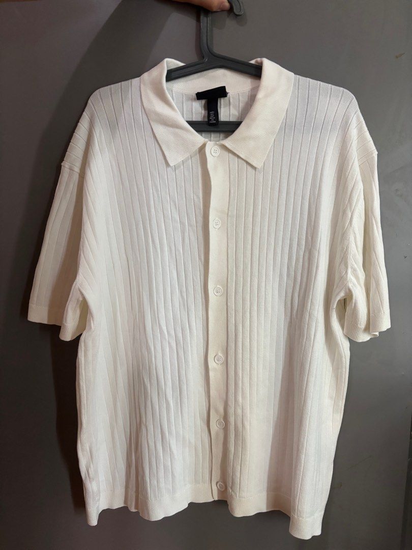 H&M Ribbed Knit Polo Shirt (Category: Tshirts & Polo Shirts ) located in Camiling. Submitted by asunacherry (Listing ID 1433058669, Image 1). Description: - H&M Cream Ribbed Knit Polo Shirt - Bought for 1,499 - Size: S (170/92A) - Style: Classic polo collar - Features: Short sleeves, button-up front - Material: Ribbed knit - Never Been Used.