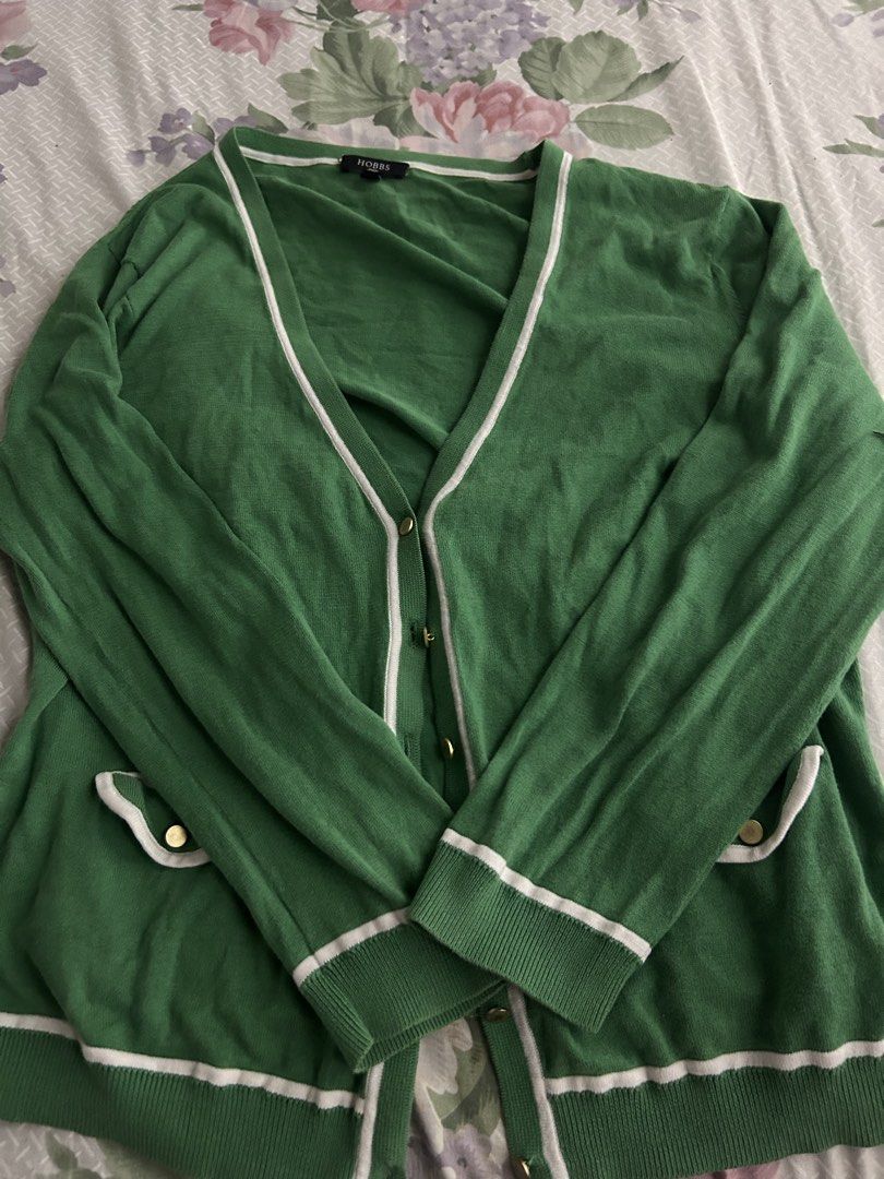 Green Cardigan (Category: Coats, Jackets and Outerwear) located in Manila. Submitted by cheatea (Listing ID 1433182126, Image 1). Description: - Hobbs London cardigan - Green color - V-neck design - White trim - Gold buttons - Visible brand tag.