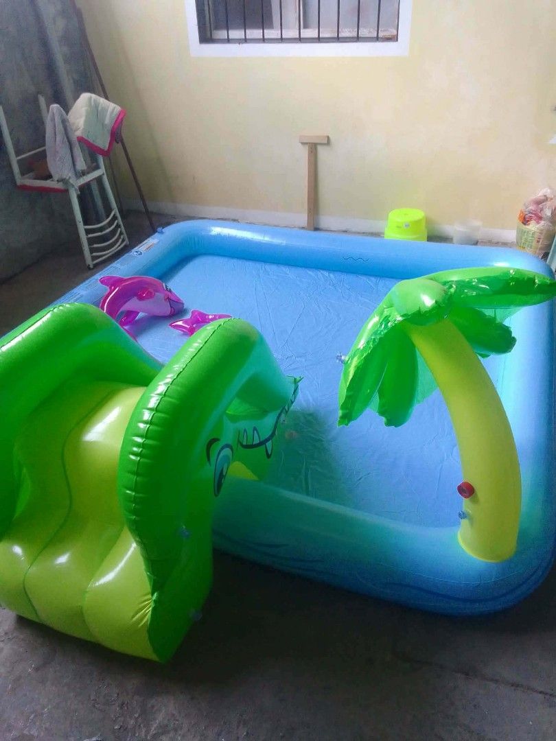 Inflatable Pool with Slide and Palm Tree (Category: Infant Playtime) located in Plaridel. Submitted by tonilousg (Listing ID 1433085674, Image 1). Description: Kids Inflatable pool with fountain and floaters for toddlers and kids Plaridel Bulacan location courier via lalamove or shapi chckout (payment first).