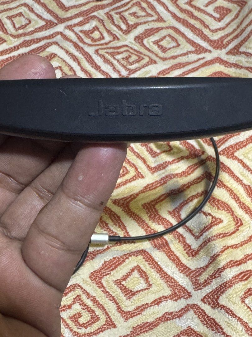 Jabra Evolve 75e Wireless Headphones (Category: Headphones & Headsets) located in Quezon City. Submitted by angace13 (Listing ID 1433082051, Image 2). Description: - Jabra Evolve 75e Wireless Headphones - Neckband design - In-ear earbuds - Color: Black and Silver - Model: HSC100W - Jabra branding visible - Control buttons included selling my original jabra evolve 75e no issue good as new in very good condition battery superb with charger no box p