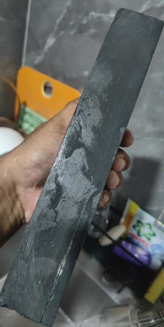 jnat Sharpening Stone (Category: Knives & Chopping Boards) located in Cavite. Submitted by sevillajoh71978 (Listing ID 1433049726, Image 1). Description: - Used sharpening stone - Dark gray color - Rectangular shape - Suitable for knives and tools.