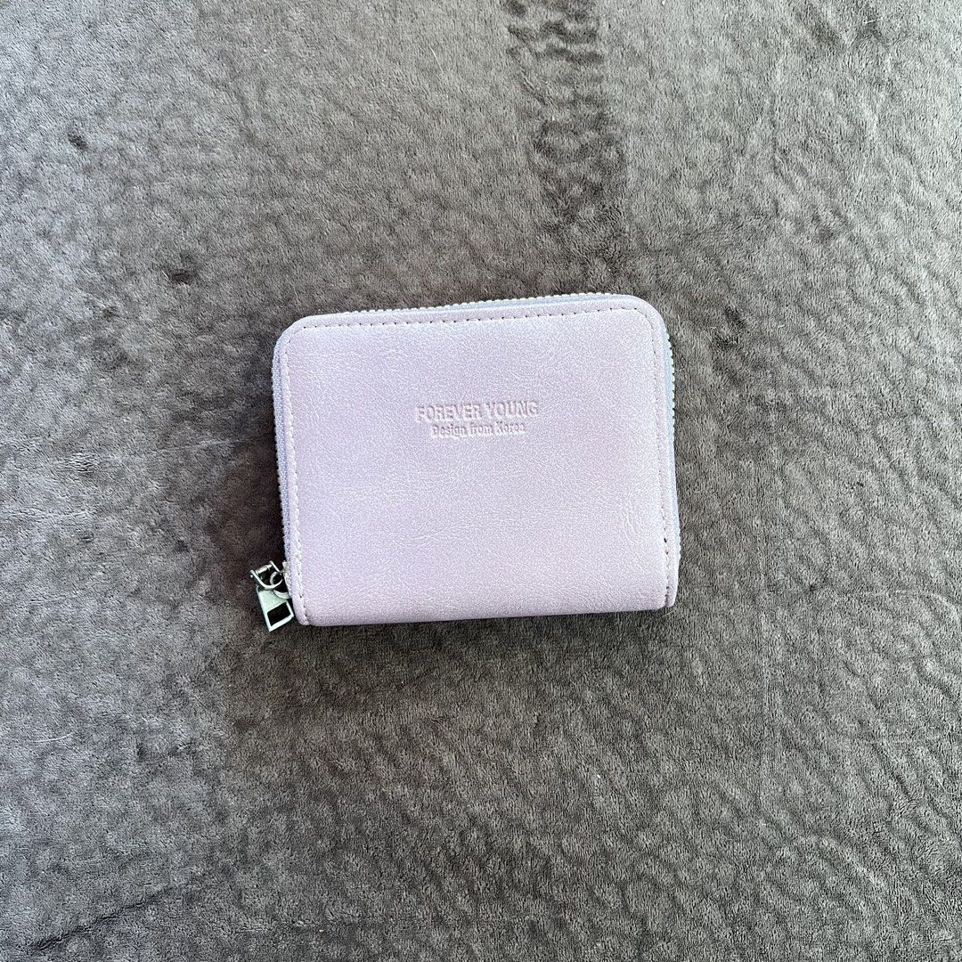 Korean Dusty pink card holder (Category: Wallets & Card holders) located in Makati City. Submitted by monu__ (Listing ID 1433057379, Image 1). Description: Pink card holder Can carry alot of cards / cash Soft pink / dusty pink color Smooth zipper.