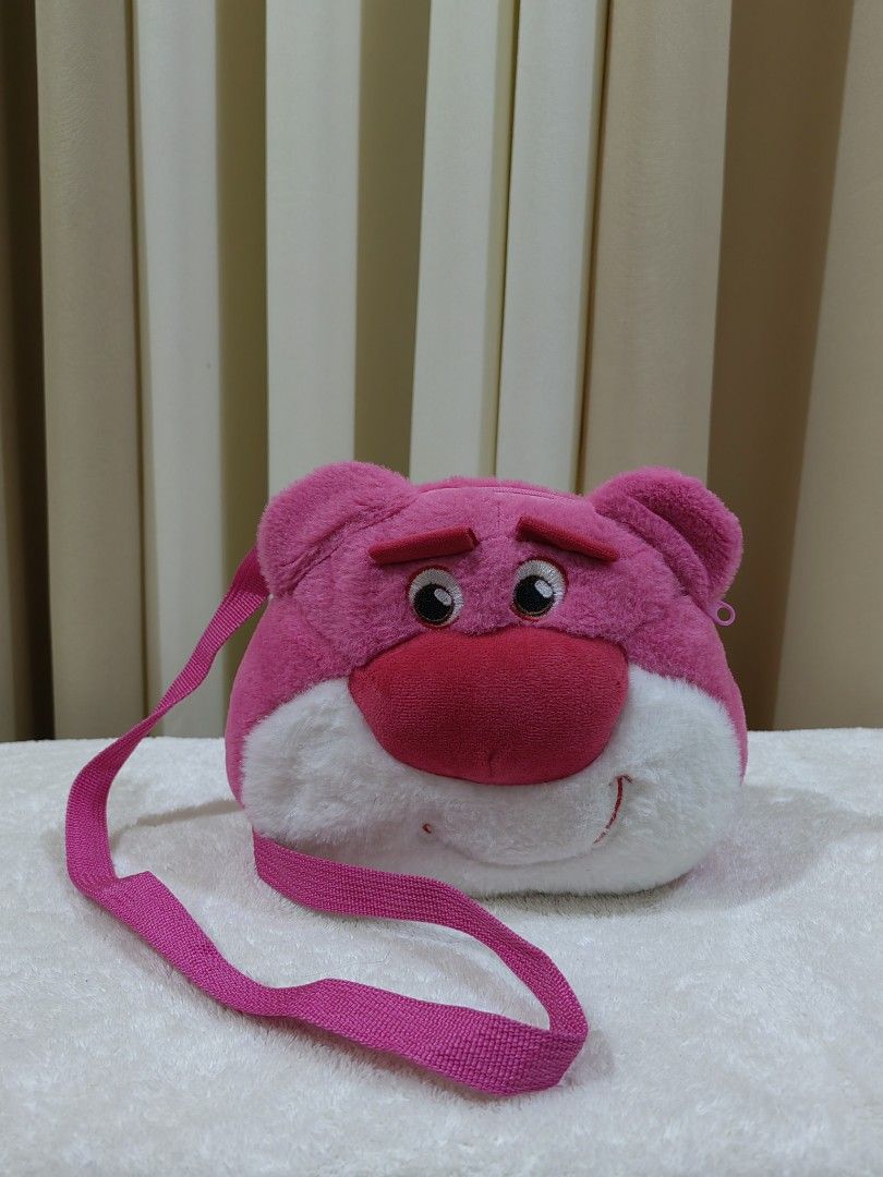 Lotso Bear Bundle Bags (Category: Plushies & Soft Toys) located in Makati City. Submitted by prelovedtreatedwithlove (Listing ID 1433140624, Image 3). Description: - Adorable Lotso Bear plush bags - Pink color scheme - Features various Lotso Bear expressions - Available with handles and shoulder straps - Perfect for carrying small items - Great accessory for Disney fans and collectors -Bundle 3 for 250 -no issue A-086.