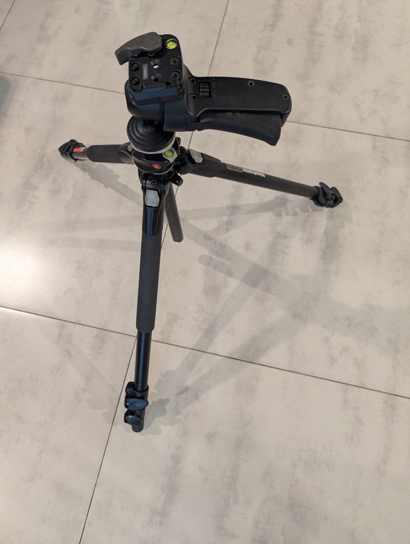 Manfrotto 190X Prob + 322RC2 Ballhead (Category: Tripods & Monopods) located in Quezon City. Submitted by sherwino (Listing ID 1433003549, Image 2). Description: This is one of the best lightweight but sturdy photography tripods. Sold only as a set, this 190xprob has mumtiple setup possibilities. The center staff can be full extended upward then angled to 90 degrees for food photography or photos requiring top or map view. This is made in Italy. 