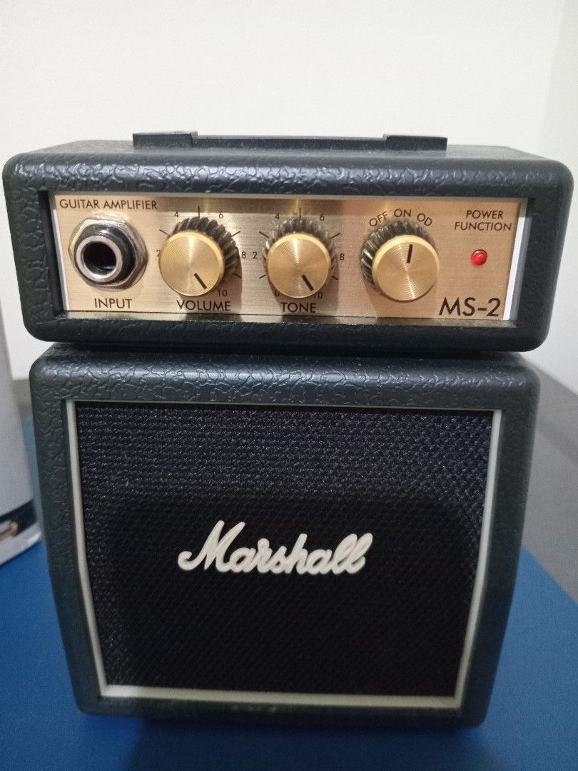 Marshall MS-2C Micro Amp (Category: Soundbars, Speakers & Amplifiers) located in Bacoor. Submitted by happydolphin.239038 (Listing ID 1433033713, Image 2). Description: - Marshall MS-2C Micro Amp - Power, Tone, and Volume Controls - Guitar Amplifier Input - Includes Original Box - Black Exterior with Marshall Logo - Small and Portable.