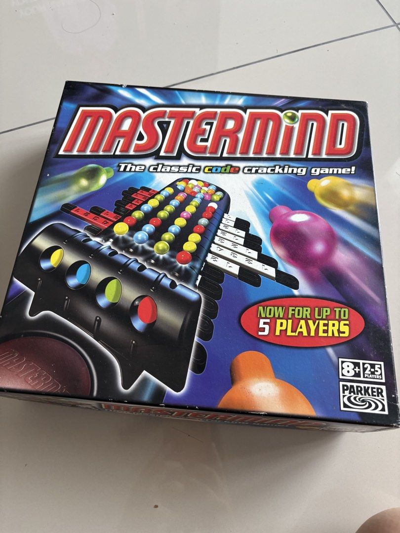Mastermind Classic Code Cracking Game (Category: Toys & Games) located in Kuala Lumpur. Submitted by alexandra_11 (Listing ID 1433014264, Image 1). Description: - Classic Mastermind game - Includes game board, pegs, and code pegs - For up to 5 players - Complete set - Recommended for ages 8+ - Fun for family and friends.