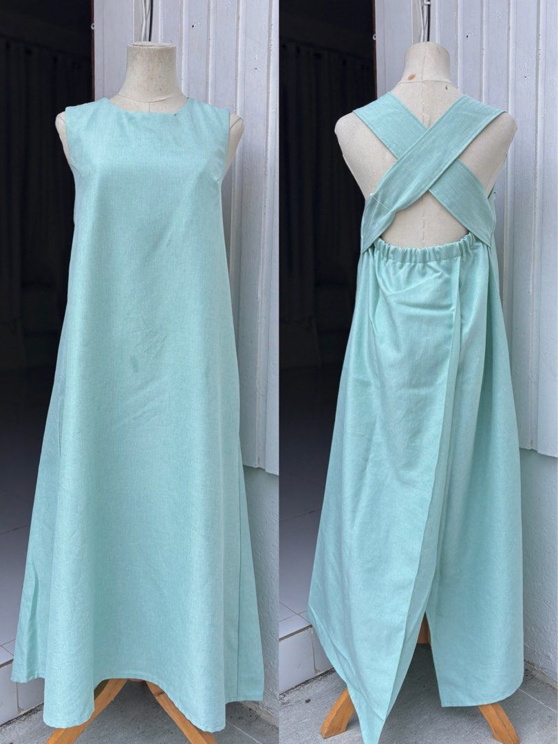 Mint Green Sleeveless Maxi Dress (Category: Dresses) located in Legazpi City. Submitted by sherrysph (Listing ID 1433149934, Image 1). Description: - Mint green maxi dress - Sleeveless design - Round neckline - Unique criss-cross strap back - Elastic waistband - Flowing, floor-length skirt - Perfect for casual wear or summer events.