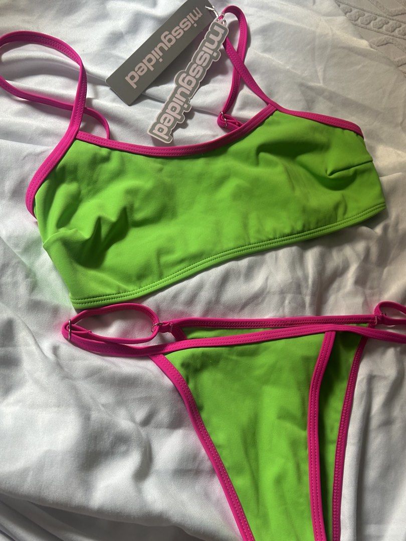 Missguided Neon Pink Green Bikini Set (Category: Bikinis & Swimsuits) located in Manila. Submitted by cryingwhilestudying (Listing ID 1433019334, Image 2). Description: Suoer cute especially with shorts or a skirt huhu Doesn’t fit my bust :( - Features a bikini top with thin straps - Brand new with original tags - Ideal for beach or pool use.