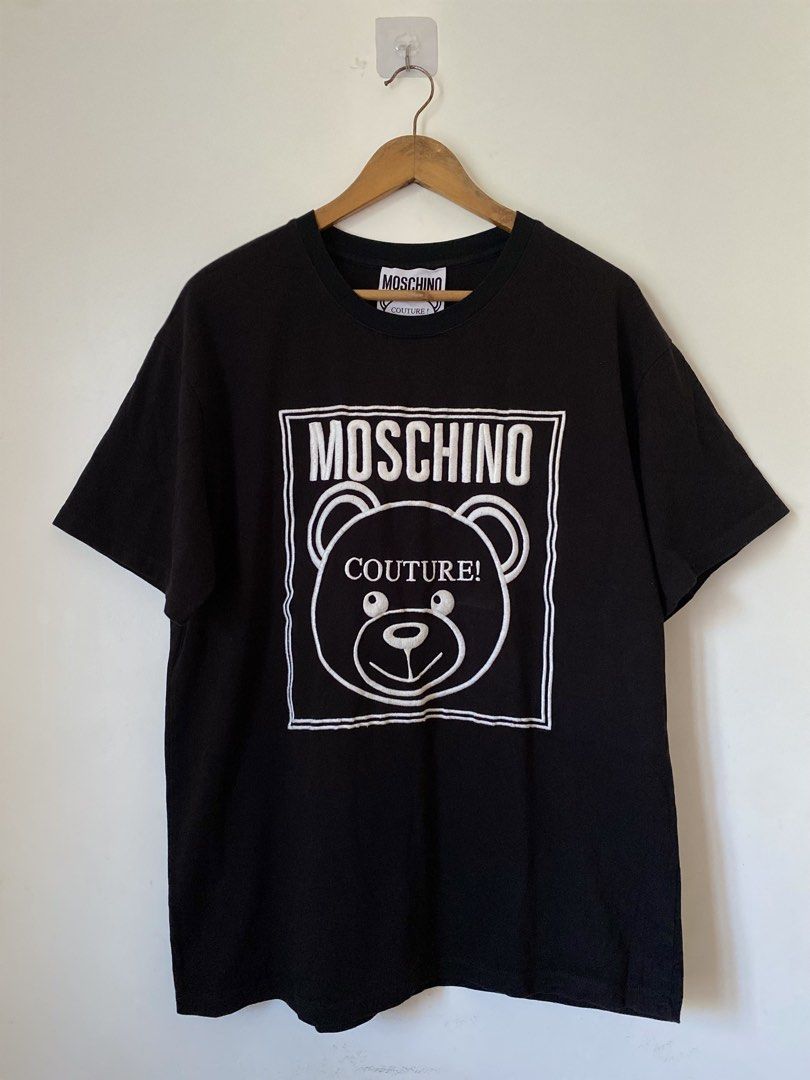 Moschino Couture Bear T-shirt (Category: Luxury Apparel) located in Binmaley. Submitted by maryjeyn (Listing ID 1433033754, Image 1). Description: - Moschino Couture T-shirt - Features a white bear graphic - Made in Italy - 100% Cotton - Crew neck - Short sleeves - Size: 22x28 Dimes.