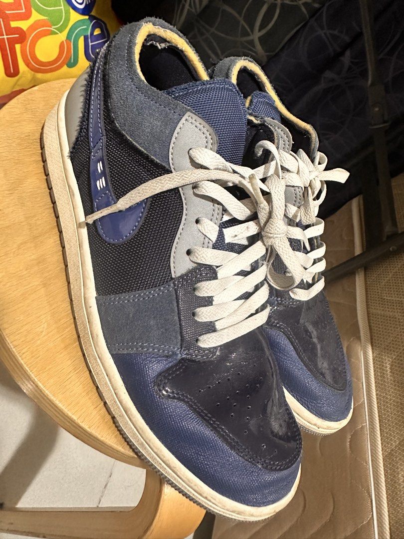 Nike Air Jordan 1 Low (Category: Sneakers) located in Dasmarinas. Submitted by etcitems (Listing ID 1433125210, Image 3). Description: - Nike Air Jordan 1 Low - Color: Blue and Grey - Size: US 8.5 / EUR 42 - Iconic Nike swoosh and Air Jordan logo - Model: DR8867-400 - Unique mixed materials design - White laces and white sole.
