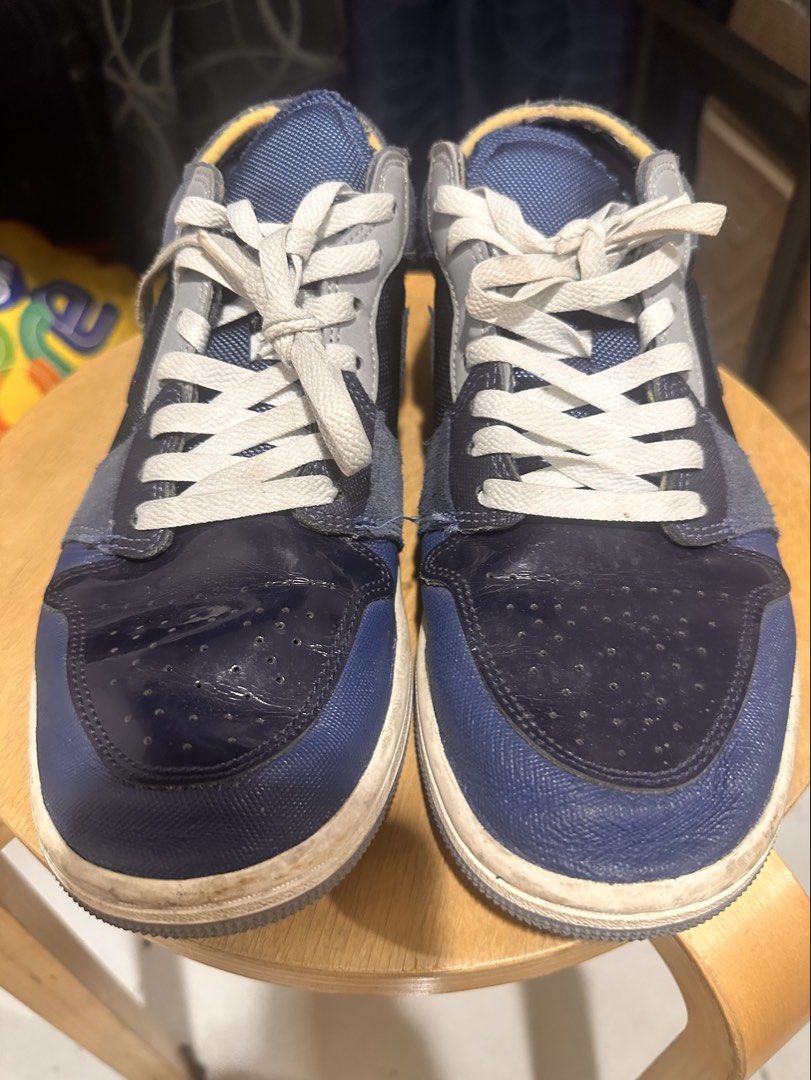 Nike Air Jordan 1 Low (Category: Sneakers) located in Dasmarinas. Submitted by etcitems (Listing ID 1433125210, Image 2). Description: - Nike Air Jordan 1 Low - Color: Blue and Grey - Size: US 8.5 / EUR 42 - Iconic Nike swoosh and Air Jordan logo - Model: DR8867-400 - Unique mixed materials design - White laces and white sole.