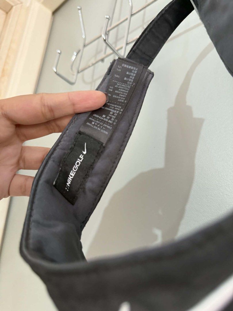 Nike Golf Visor (Category: Caps & Hats) located in Manila. Submitted by thasiasantos (Listing ID 1433136708, Image 2). Description: - Black Nike Golf visor - Features Nike logo - Adjustable strap for a custom fit - One size fits most - Made with polyester and cotton.