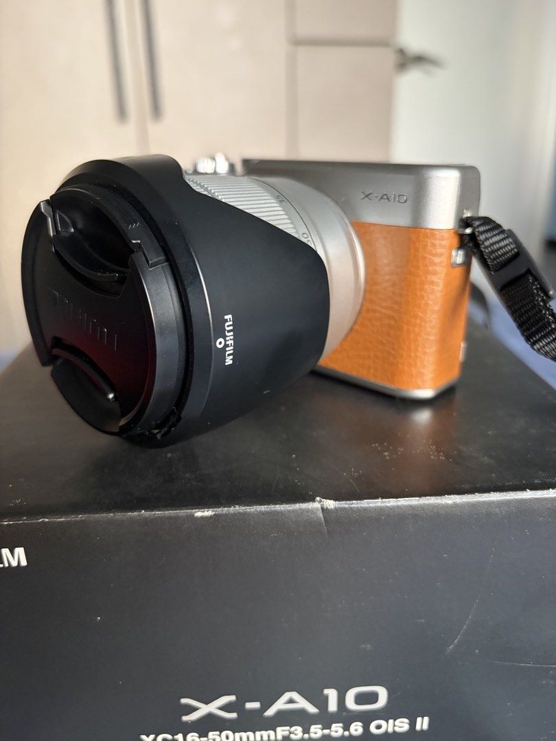 Fujifilm X-A10 Brown Marron (Category: Cameras) located in Quezon City. Submitted by jenibon9 (Listing ID 1433105576, Image 2). Description: Barely used Good as new Comes complete with original box battery , charger , camera strap No issues whatsoever. Test all you want .