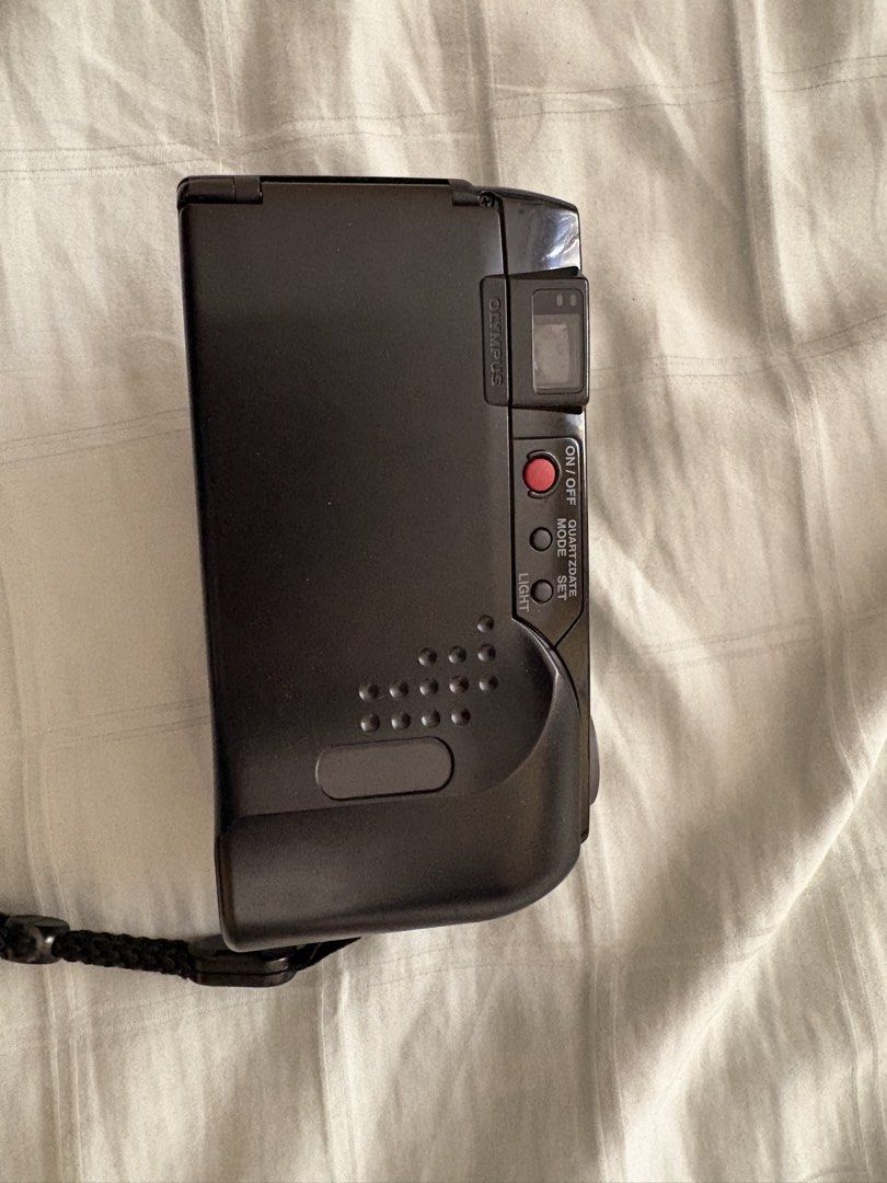 Olympus Superzoom 80 Wide Film Camera (Category: Cameras) located in Manila. Submitted by fiercephoenix.63e29d (Listing ID 1433081483, Image 3). Description: - Olympus Superzoom 80 Wide film camera - As is. No batteries. No sample shots. Not tested. - 28-80mm zoom lens - Built-in flash - Includes strap and original box - Quartz Date function - Made in Japan.