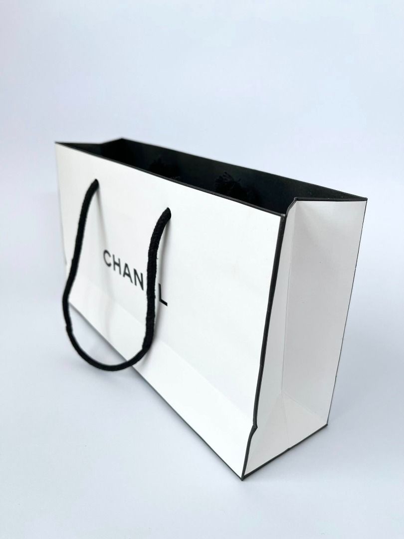 Original White Chanel Paper Bag (Category: Luxury Bags & Wallets) located in Llanera. Submitted by denxlab (Listing ID 1433131569, Image 1). Description: Original Chanel Paper Bag (Like New) ✨ Add a touch of luxury to your collection or packaging! 🤍 This original Chanel paper bag is perfect for gifting, reselling, or aesthetic display. 🖤 Condition: Like New (very minimal signs of use) 🖤 Size: 24cm x 7cm x 14cm 🖤 Clean, sturdy, and elegant — s