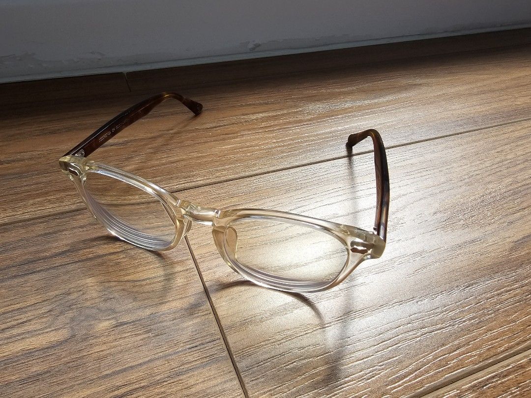 OWNDAYS John Dillinger Eyeglasses (Category: Sunglasses & Eyewear) located in Manila. Submitted by tech_by_trx (Listing ID 1433066740, Image 2). Description: Classic, Timeless, "Old Money" Style - OWNDAYS JOHN DILLINGER series eyeglasses - Clear frame with brown temples - Includes case and cleaning cloth - Round shape - OWNDAYS case Lens height: 45mm Frame width: 140mm Length /Temple: 140mm.