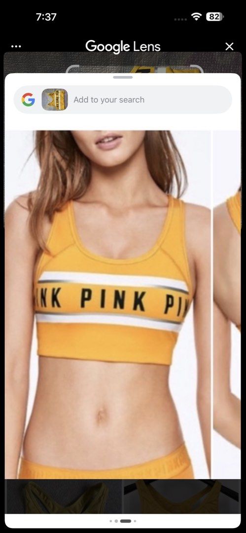Pink Victoria's Secret Ultimate Sports Bra (Category: Activewear) located in Manila. Submitted by juanabanana (Listing ID 1433140958, Image 1). Description: Yellow sports bra from Pink Victoria's Secret. Features the brand name across the chest in black lettering with a white and silver stripe. The bra has a racerback design. Size is S/P (Small/Petite). The bra is made of a blend of polyester and spandex. Needs wash.