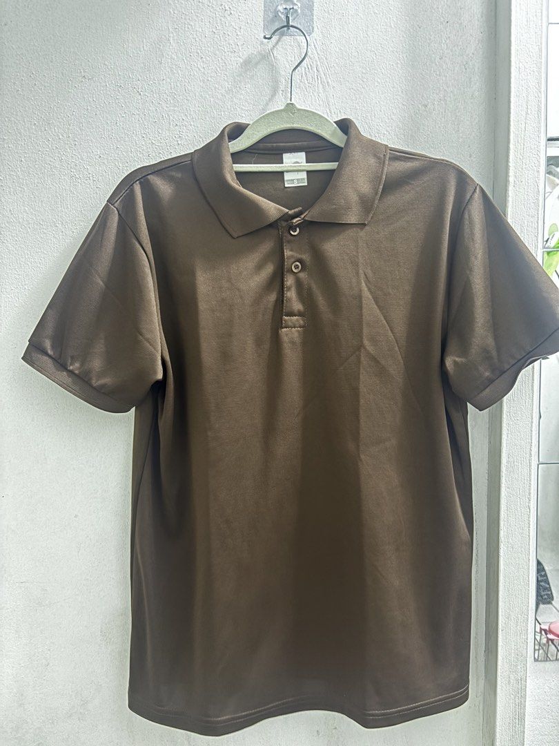 Plain Polo Shirt - Dark Grey and Brown (Category: Tshirts & Polo Shirts ) located in Quezon City. Submitted by baristaseller (Listing ID 1433122801, Image 2). Description: - Classic polo shirt - Available in dark grey and brown - Collared neckline - Short sleeves - Three-button placket - Made from smooth fabric - Suitable for casual and semi-formal occasions - Easy to mix and match • ₱140 each but for both ₱ 250.00.