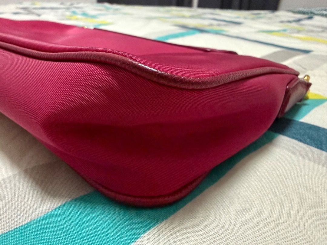 Prada Chain Bag (Category: Luxury Bags & Wallets) located in Los Banos. Submitted by cailawas (Listing ID 1433031566, Image 3). Description: - Authentic Prada chain bag - looks new - Stunning pink color - Elegant gold chain strap - Secure flap closure with Prada logo - Comes with a dust bag for storage.