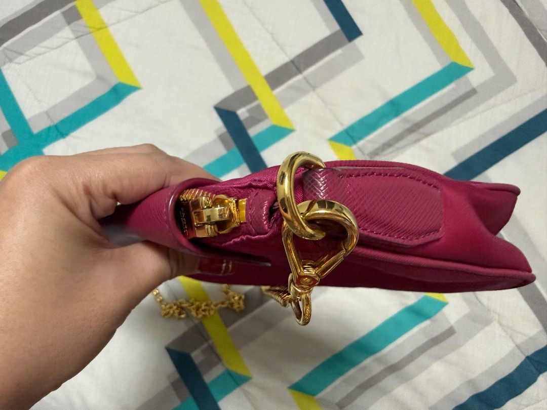 Prada Chain Bag (Category: Luxury Bags & Wallets) located in Los Banos. Submitted by cailawas (Listing ID 1433031566, Image 2). Description: - Authentic Prada chain bag - looks new - Stunning pink color - Elegant gold chain strap - Secure flap closure with Prada logo - Comes with a dust bag for storage.