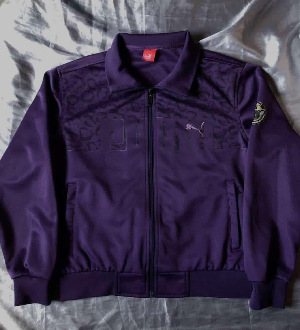 Puma Track Jacket (Category: Coats, Jackets and Outerwear) located in Taguig. Submitted by marked_item (Listing ID 1416036012, Image 1). Description: - Dark leopard Puma track jacket - Full zip closure - Two front pockets - Puma logo on chest - As new condition .