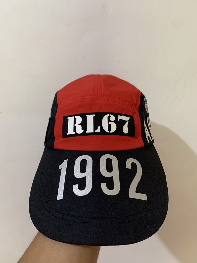 Ralph Lauren Stadium RL67 1992 Cap! (Category: Caps & Hats) located in Subic. Submitted by studiogarments (Listing ID 1433061242, Image 1). Description: - Polo Ralph Lauren cap - Color: Red and Black - Design: "RL67" and "1992" print on front - Side Prints: "AMERICA" and "STADIUM" - Size: L/XL (59cm).