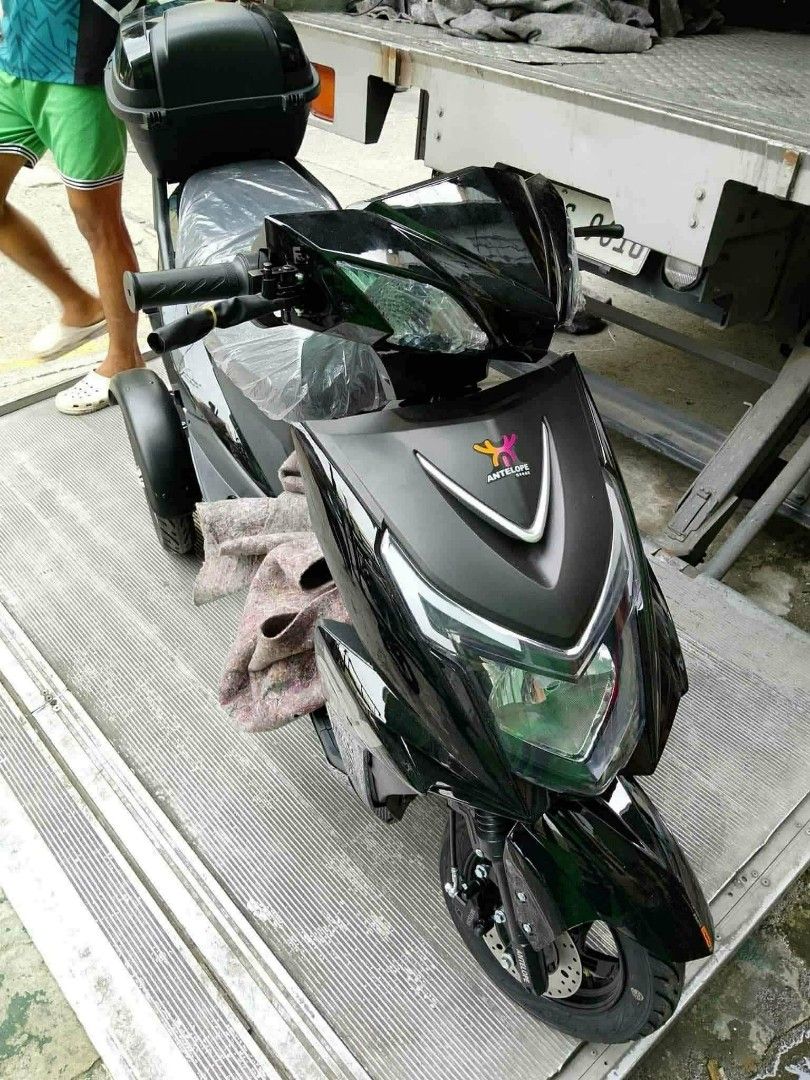 S02 3 Wheels Motorcycle (Category: Bicycles) located in Manila. Submitted by kairos_luckyonlineshop (Listing ID 1433052294, Image 3). Description: ▪️1200W ▪️60V x 20AMP ▪️45KPH ▪️40KM LONG DRIVE ▪️TUBELESS 3.00 x 8 ▪️DISC BRAKE ▪️DIFFERENTIAL MOTOR HUB ▪️DUAL SUSPENSION ▪️MONITOR PANEL ▪️KEYS/REMOTE ▪️THEFT ALARM ▪️SIDE MIRRORS ▪️HORN ▪️DRIVE/REVERSE MODE ▪️PARKING FUNCTION ▪️HIGH, MEDIUM and LOW SPEEDS ▪️HEADLIGHT ▪️SIGNAL LIGHTS ▪️HAZARD LIGHTS