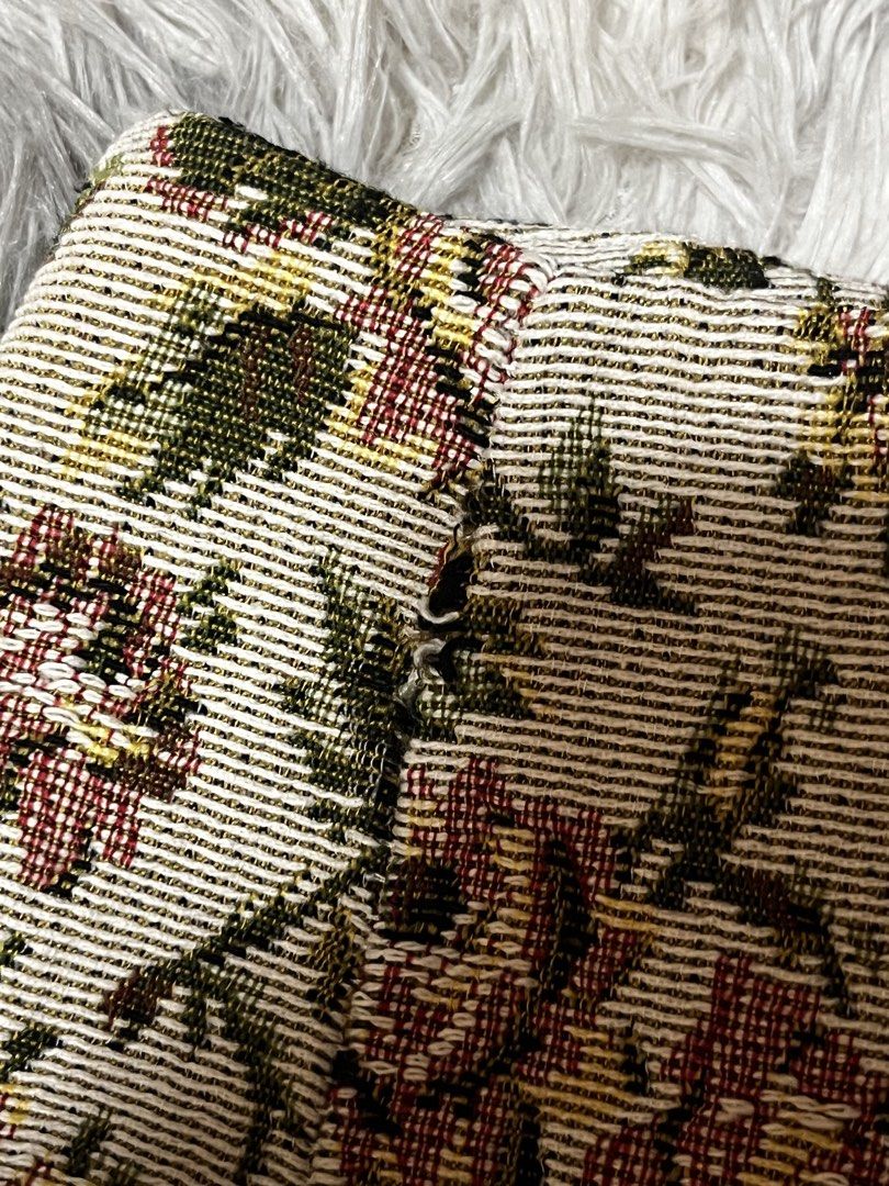 SHEIN Floral Mini Skirt (Category: Skirts) located in Roxas. Submitted by lacerna_wears (Listing ID 1433026875, Image 3). Description: - SHEIN mini skirt - Size: L - Floral pattern - Zipper closure - Front split detail - Woven fabric - see 3rd photo for honest issue (barely noticeable).