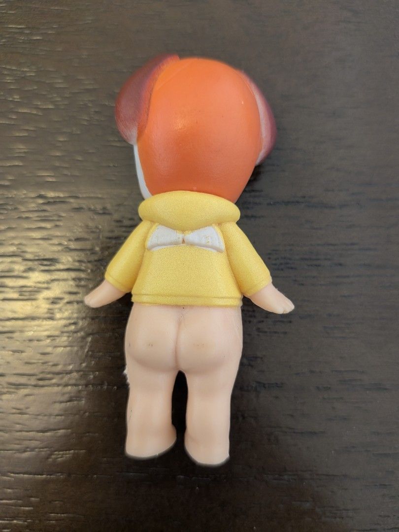 Sonny Angels Bow Wow Figurine (Category: Designer & Blind Box Toys) located in Singapore. Submitted by ma126 (Listing ID 1433062043, Image 2). Description: - Adorable Sonny Angels figurine. - Features a cute dog-themed outfit. - Comes with a yellow hoodie. - Perfect for collectors. - 7.5cm heights.