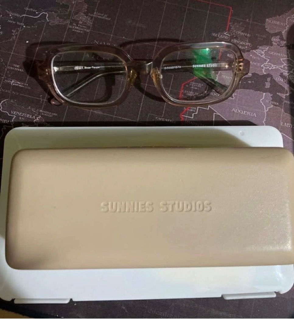 Sunnies Studios Optical Frame Ezra Rose Taupe (Category: Sunglasses & Eyewear) located in Caloocan City. Submitted by silverfire-9a5d (Listing ID 1433132481, Image 2). Description: - Sunnies Studios Optical Frame Ezra - Color: Rose Taupe - Includes eyeglasses and case - Frame Shape: Rectangular - Case Color: Beige with embossed brand name - Lenses: Replaceable.