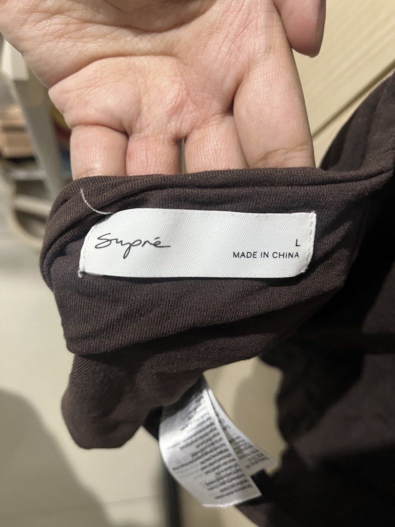 Supre Brown Backless Top - Size L (Category: Sleeveless) located in Quezon City. Submitted by nmxni (Listing ID 1433001757, Image 3). Description: - Bought in Australia - Supre brown backless top - Size: L - Short sleeves - Fitted - Soft One of the inner elastic bands are broken but the shirt is in good condition RFS: not being used.