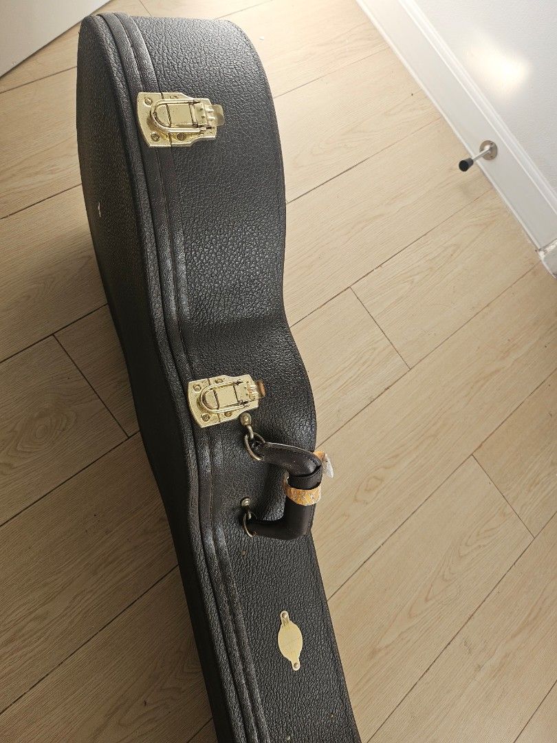 Taylor Guitar Hard Case (Category: Musical Instruments) located in Quezon City. Submitted by choco_guacamole (Listing ID 1433023584, Image 3). Description: - Taylor Grand Auditorium Deluxe Black Hardshell Guitar Case - Fits Taylor 324ce or similar models (ex. Taylor Grand Auditorium guitars in all configurations—standard 14-fret, 12-fret, and older NS4 models) - Foam padding with red velvet interior - gold colored hardware - Accessory compartment