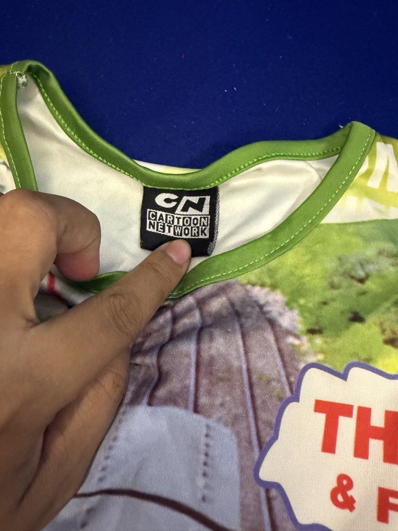 Thomas & Friends Tank Top and Shorts Set (Category: Babies & Kids Fashion) located in Makati City. Submitted by prelovedkitty13 (Listing ID 1433094933, Image 2). Description: - Thomas & Friends tank top and shorts set. - Features a colorful print of Thomas the Tank Engine and friends. - Includes a sleeveless top and matching shorts. - Ideal for young fans. - Made from comfortable fabric..